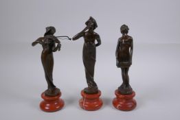 Three Art Nouveau style bronzes of women, 22cm highest