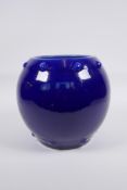 A Chinese blue glazed porcelain barrel shaped vase, KangXi 6 character mark to base, 19cm high, 22cm