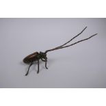 A Japanese Jizai style bronze beetle with articulated li8mbs, 12cm long