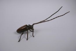 A Japanese Jizai style bronze beetle with articulated li8mbs, 12cm long