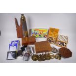 A collection of vintage travel sized board games, a brass telescope, and quantity of hip flasks, two