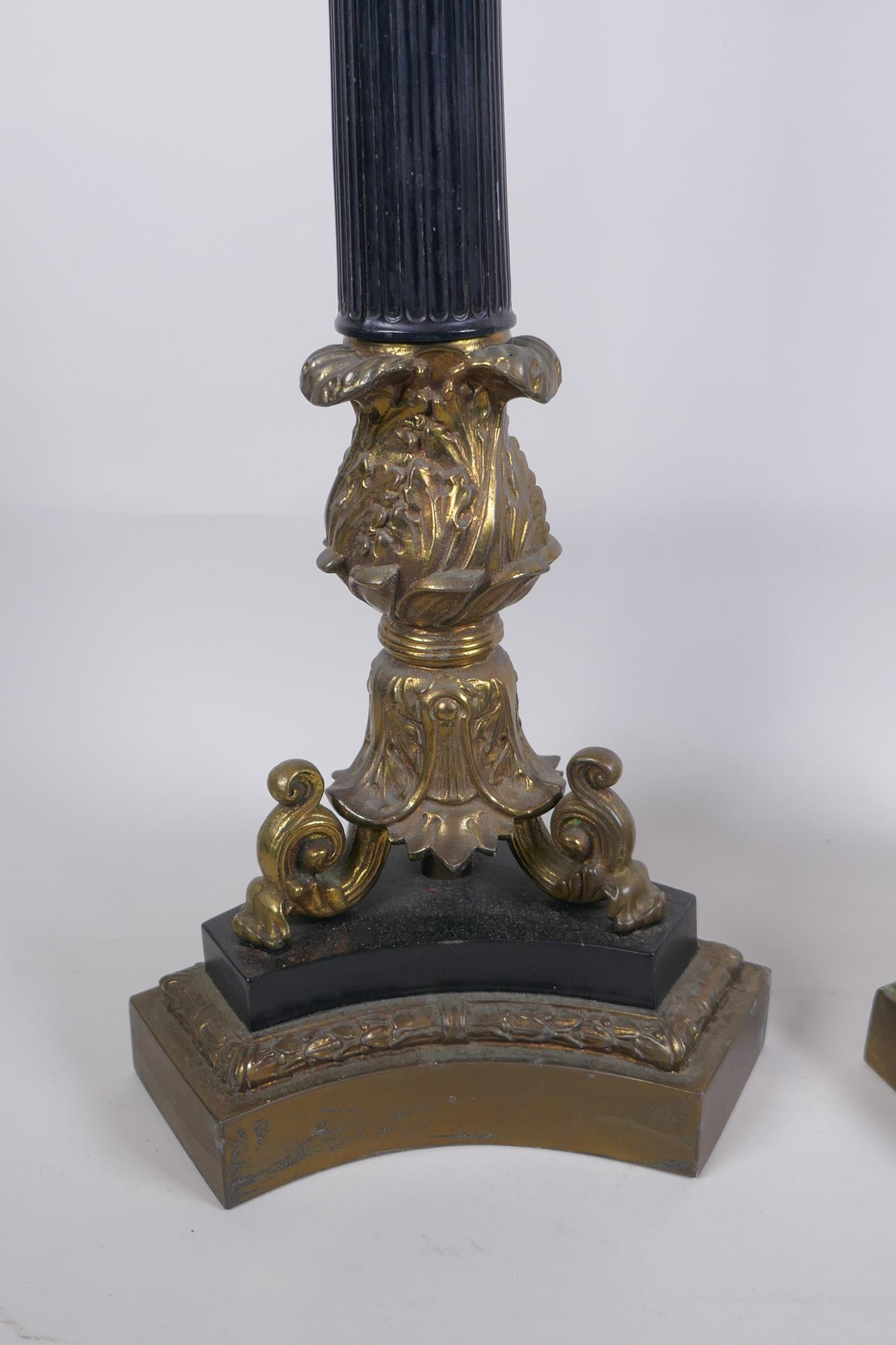 A pair of Empire style bronze and ormolu Corinthian four branch table lamps, 98cm high - Image 4 of 4