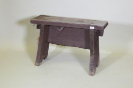 An antique painted wood bench, 76 x 26 x 51cm