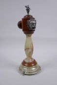 A unique onyx and turned wood pepper mill with silver plated mounts, the pepper dispensed through