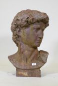 A hollow cast iron bust after Michelangelo's David, 70cm high