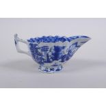 A pearlware blue and white porcelain sauce boat, 11 cm long