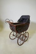 A Victorian style doll's pram, 52 x 24 x 63cm