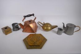 A quantity of Arts and Crafts metal wares including a copper kettle, brass teapot, hammered pewter