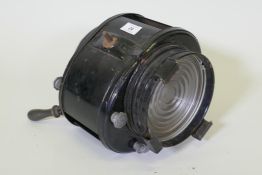 A.E. Cremer, Paris, an antique French metal industrial/theatre spot light, 26 x 28cm, lens 176cm