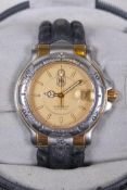 A Tag Heuer Professional Quartz 200 meters wristwatch with date aperture, the case marked U49976 and
