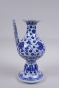 A Chinese blue and white porcelain pourer with scrolling lotus flower, 22cm high, Xuande 6 character