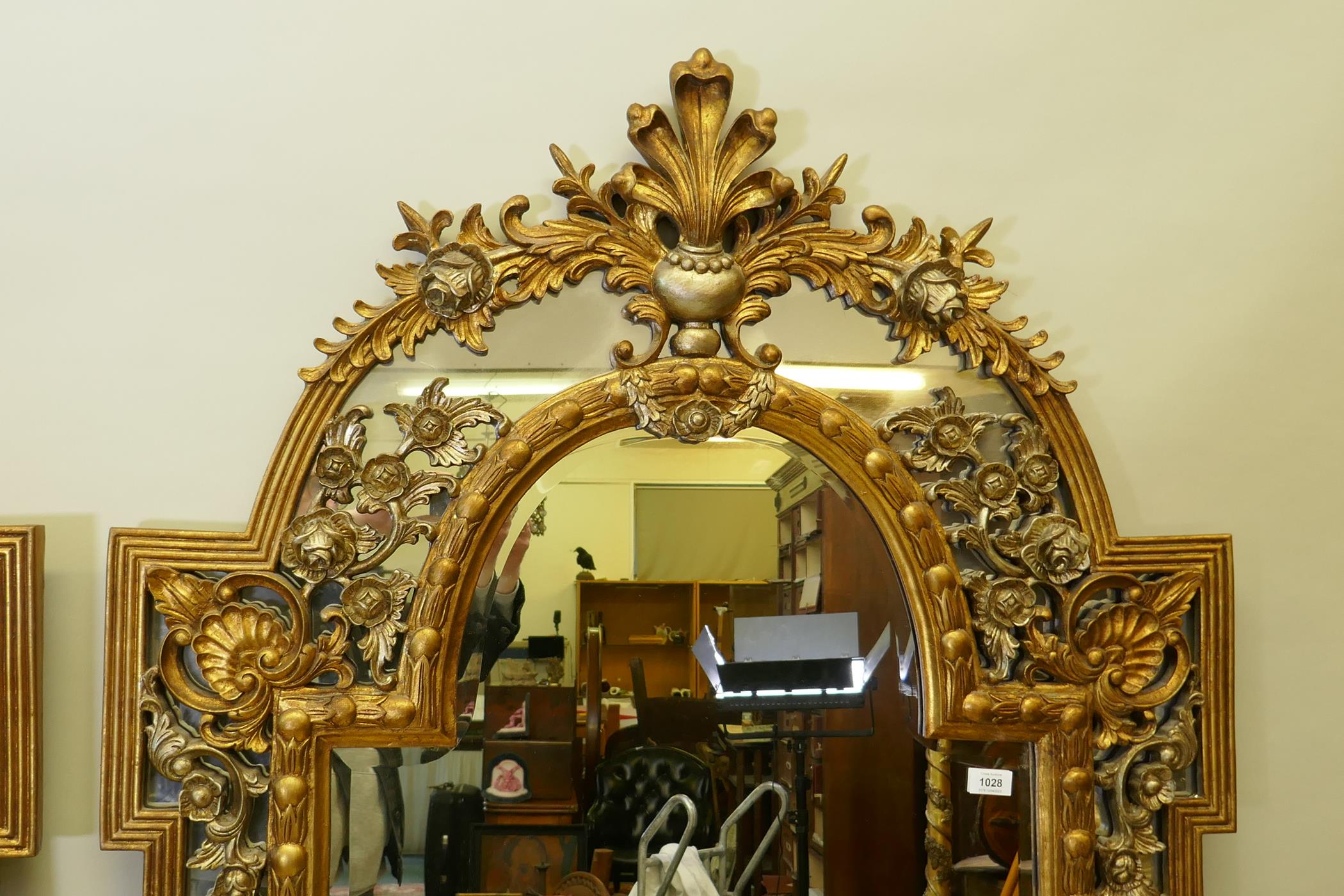 A pair of Rococo style gilt composition wall mirrors with moulded floral detail, 99 x 198cm high - Image 4 of 5