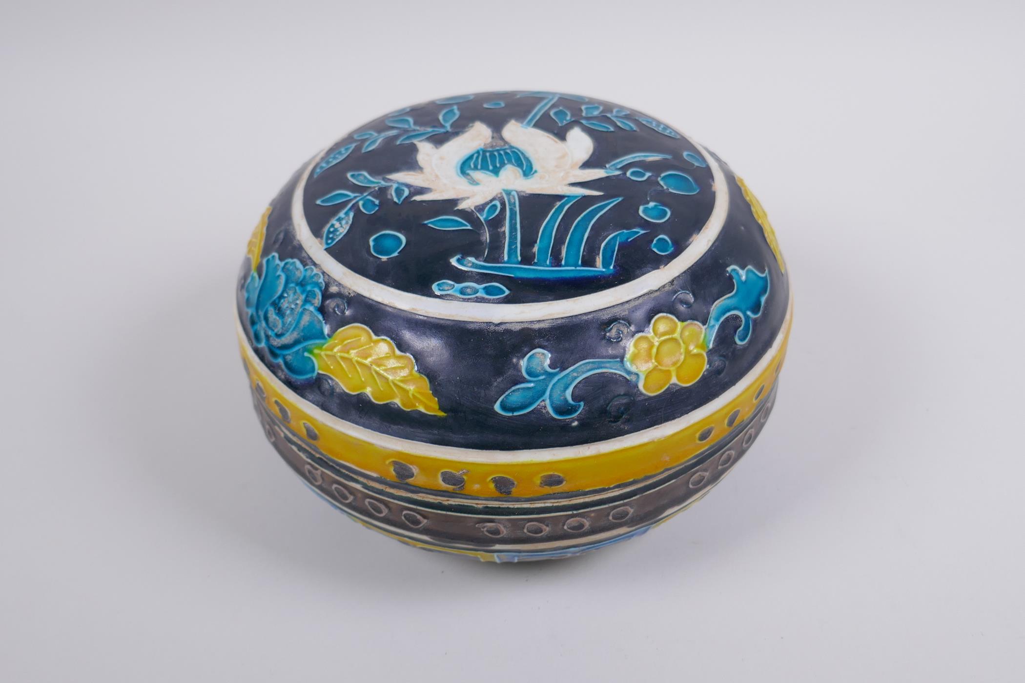 A Chinese fahua porcelain box and cover with lotus flower decoration, 18cm diameter - Image 2 of 6