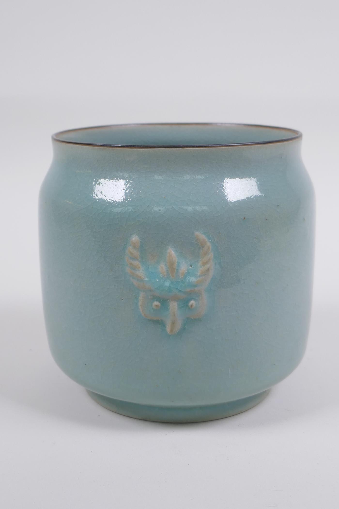 Chinese Ru ware style celadon glazed jar with twin mask decoration, 12cm high x 12cm diameter - Image 3 of 5
