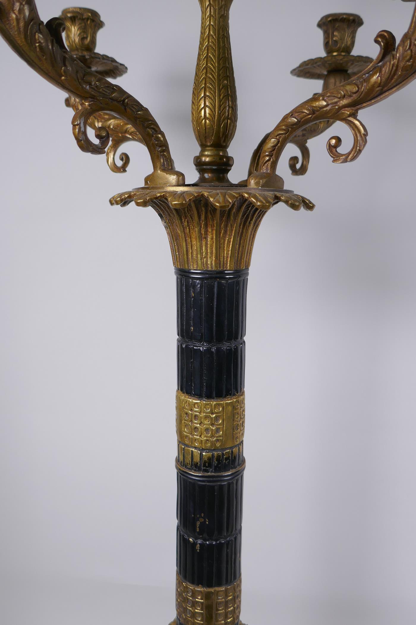 A pair of Empire style bronze and ormolu Corinthian column four branch candelabra, 80cm high - Image 4 of 7