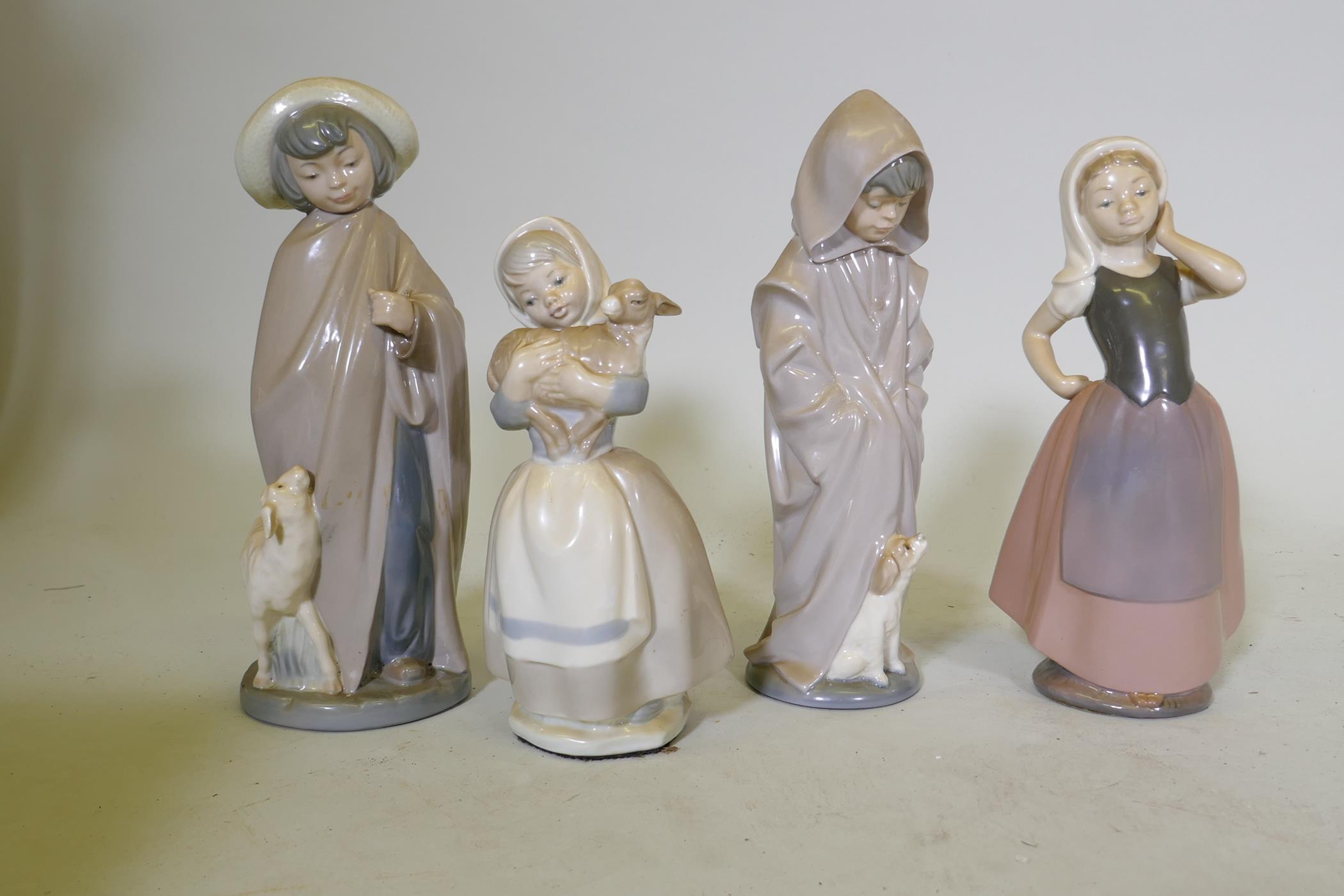 Four Nao porcelain figures, girl with a lamb, 25cm high