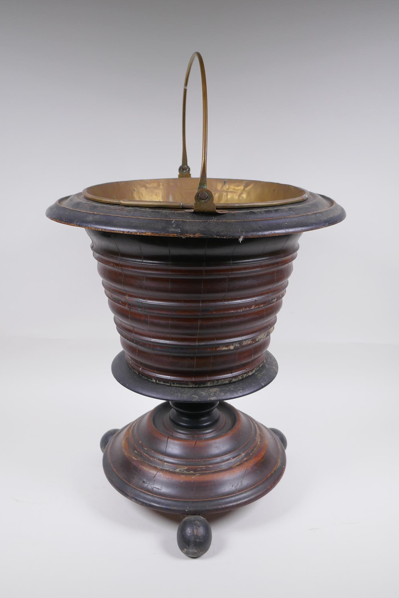 A Dutch coopered wood and brass lined peat bucket/champagne cooler, raised on ball feet, 42cm - Image 2 of 5
