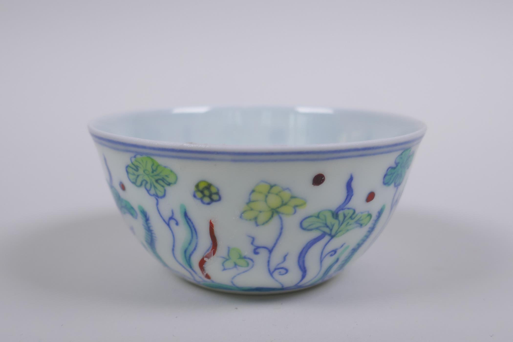 A Doucai porcelain tea bowl with lotus pond decoration, Chinese Chenghua 6 character mark to base, - Image 3 of 7