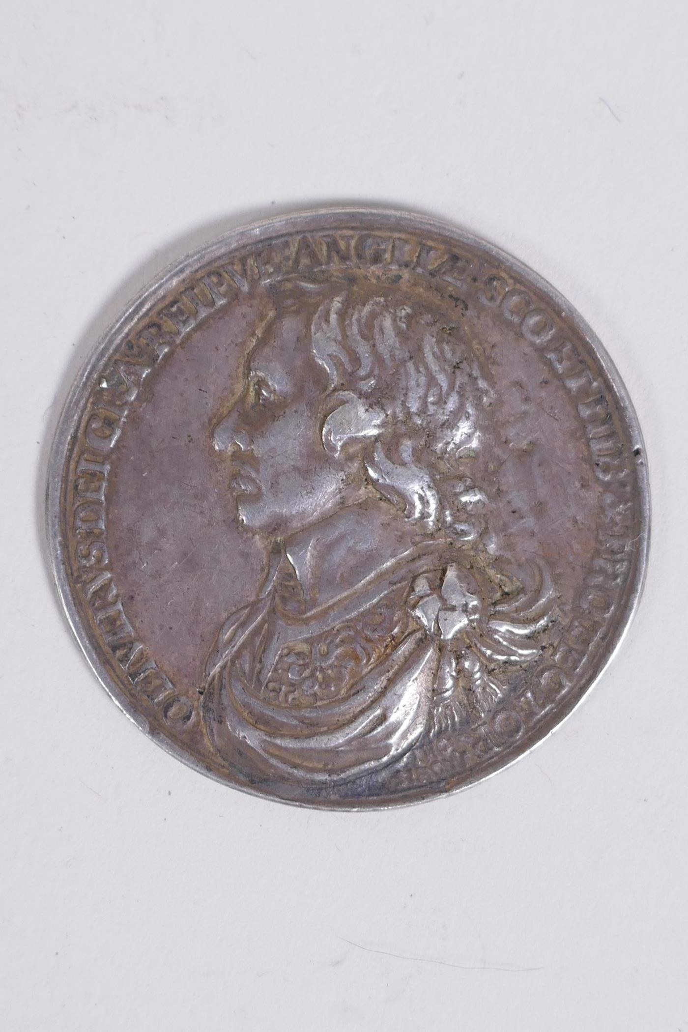 Oliver Cromwell, Lord Protector, cast silver medal, 1653, by Thomas Simon, armoured and draped