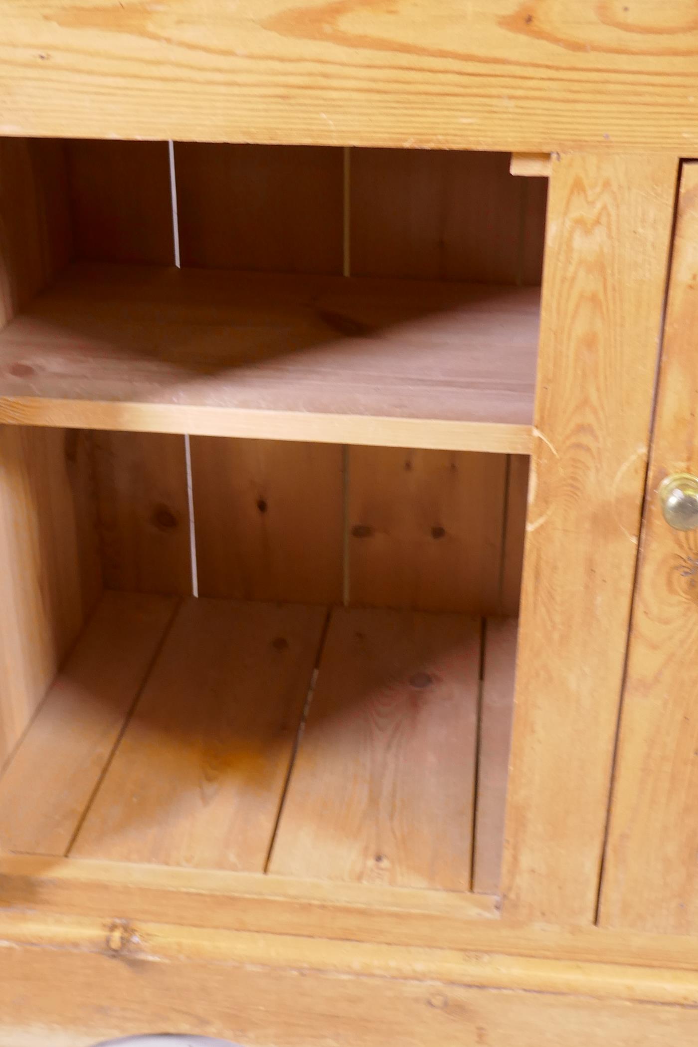 A pine dresser, the upper section with delft rack over four drawers, open sides, the base with - Image 5 of 5