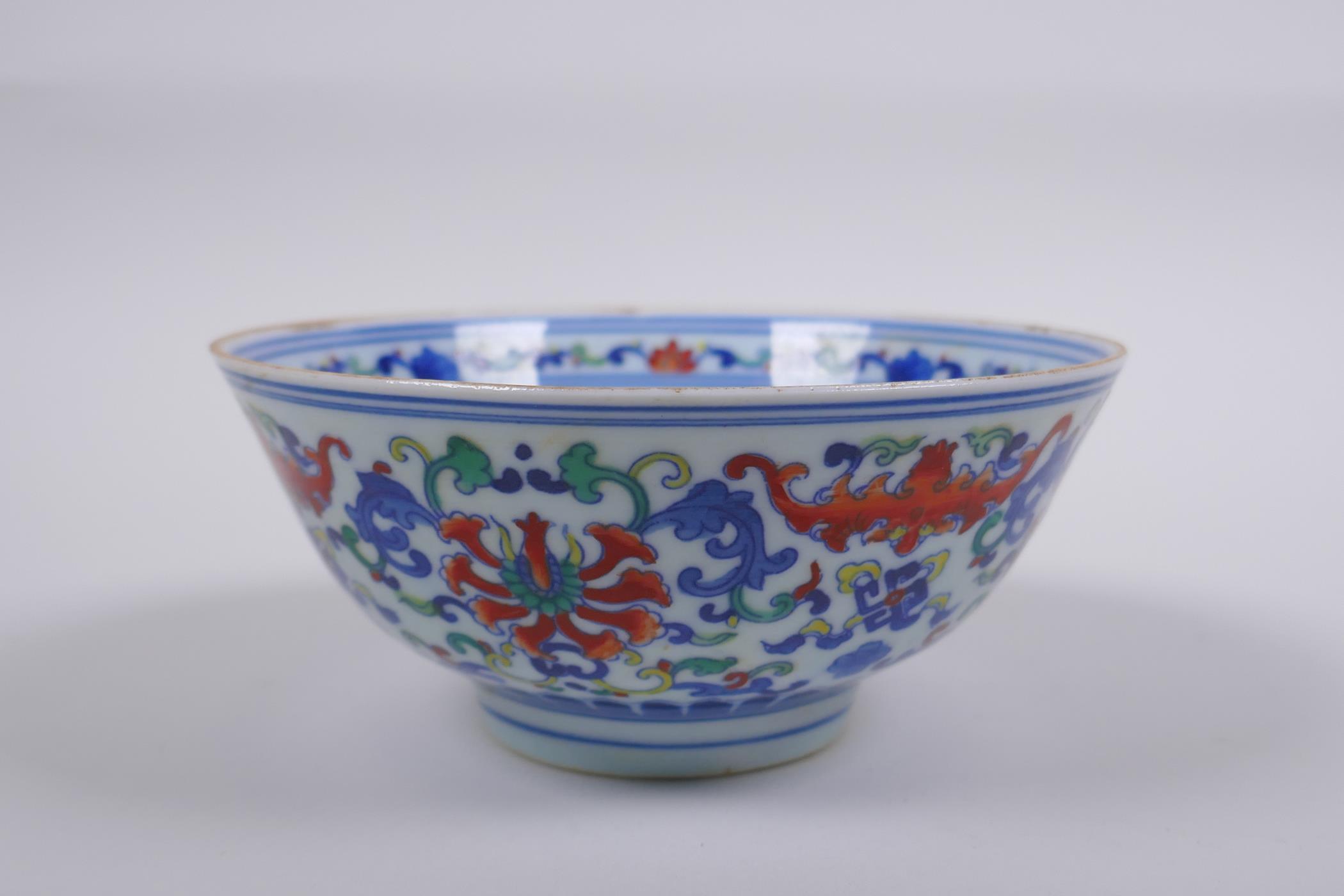 A Chinese wucai porcelain rice bowl decorated with bats and lotus flowers, YongZheng 6 character - Image 3 of 7