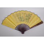 A Chinese bamboo and silk fan with printed decoration of birds amongst branches in bloom, with