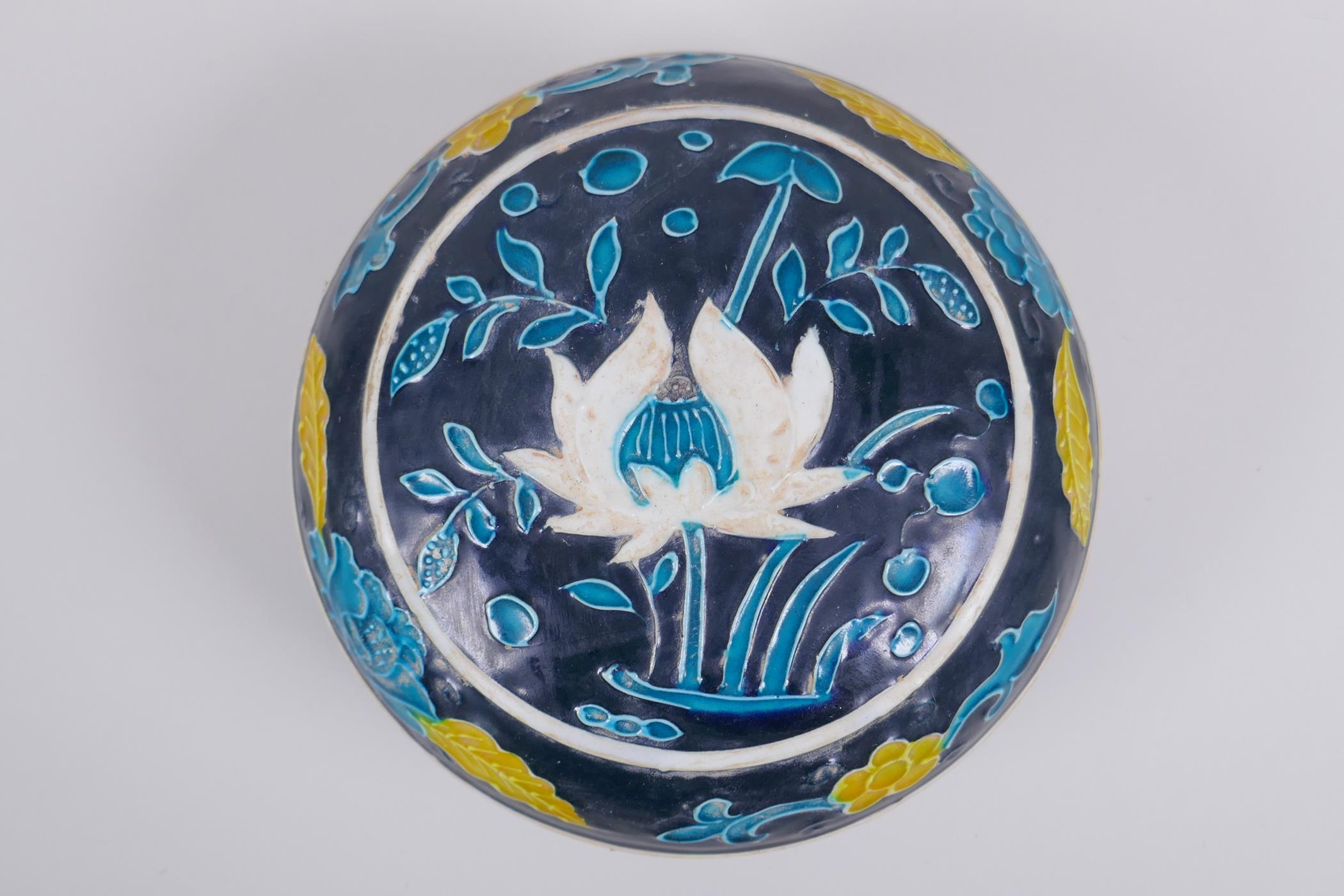 A Chinese fahua porcelain box and cover with lotus flower decoration, 18cm diameter - Image 3 of 6