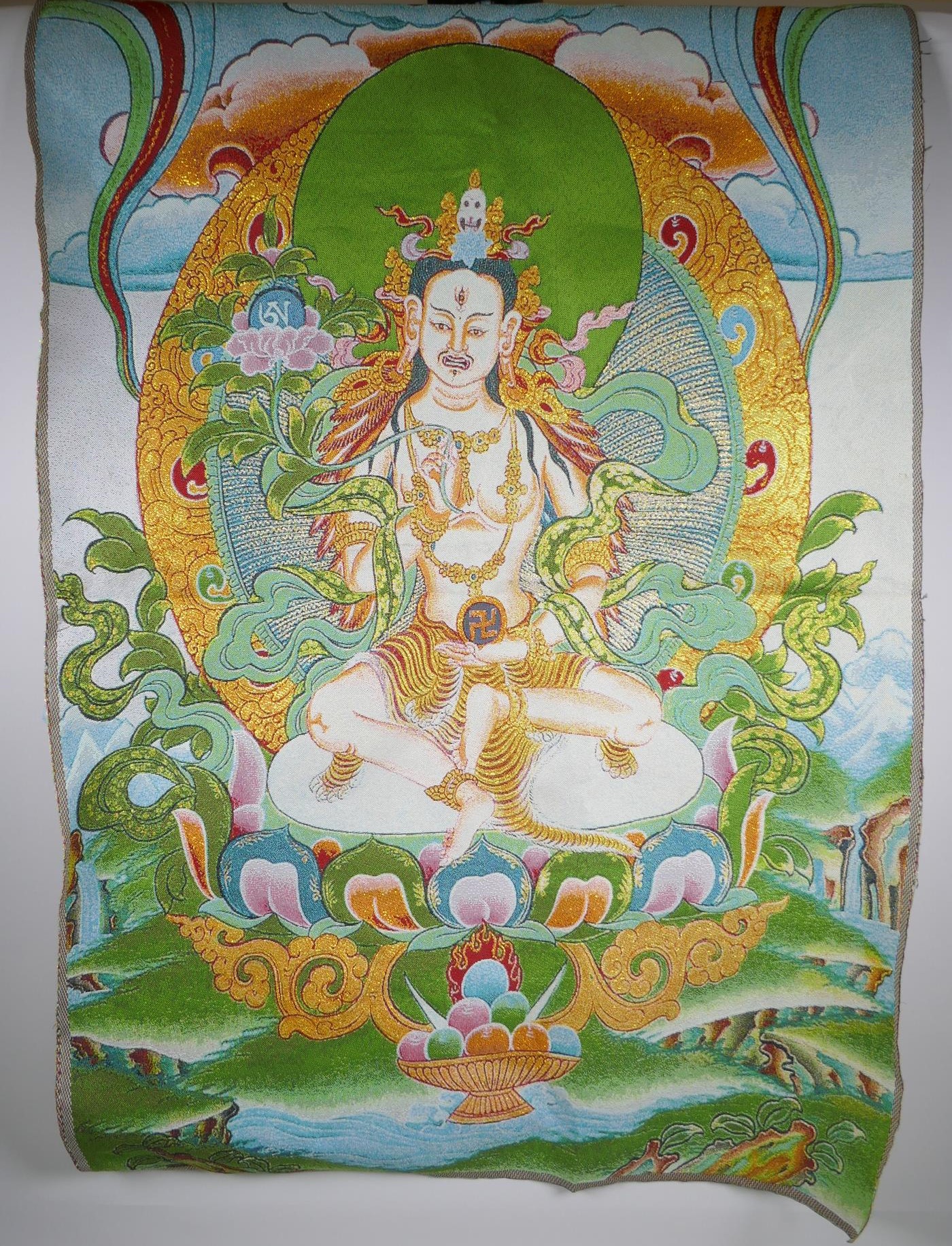 A Tibetan embroidered thangka with gilt thread highlights, 90 x 62cm - Image 2 of 2