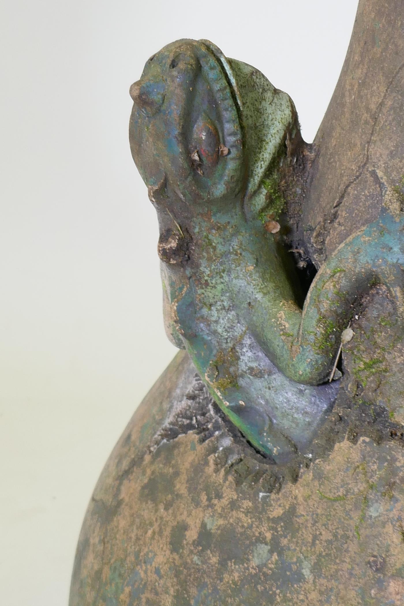 A terracotta garden vase with an applied and painted lizard, historic repair, 66cm high - Image 2 of 6