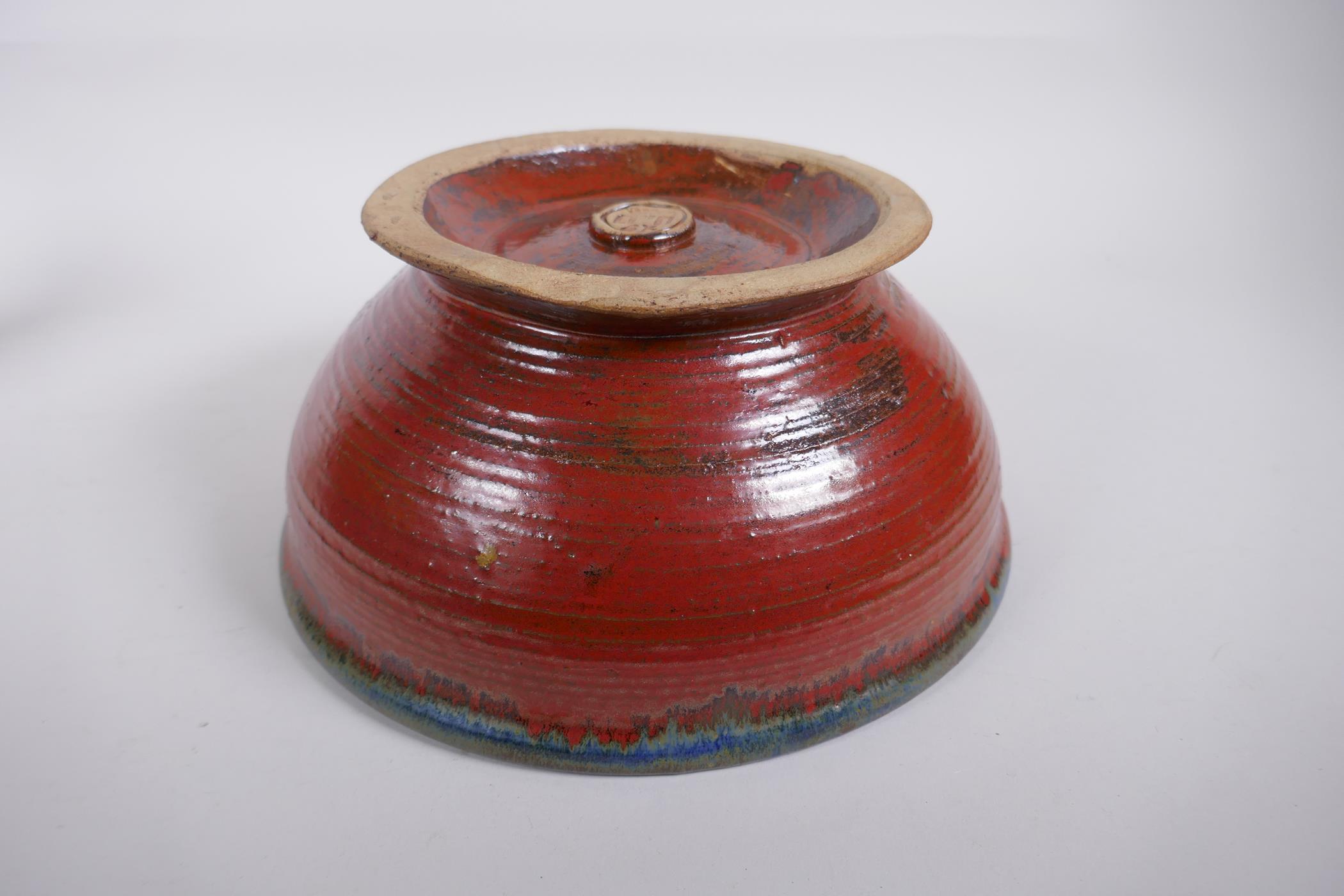 A studio pottery bowl with an iron red glaze to the exterior and hares fur style glaze to the - Image 4 of 7