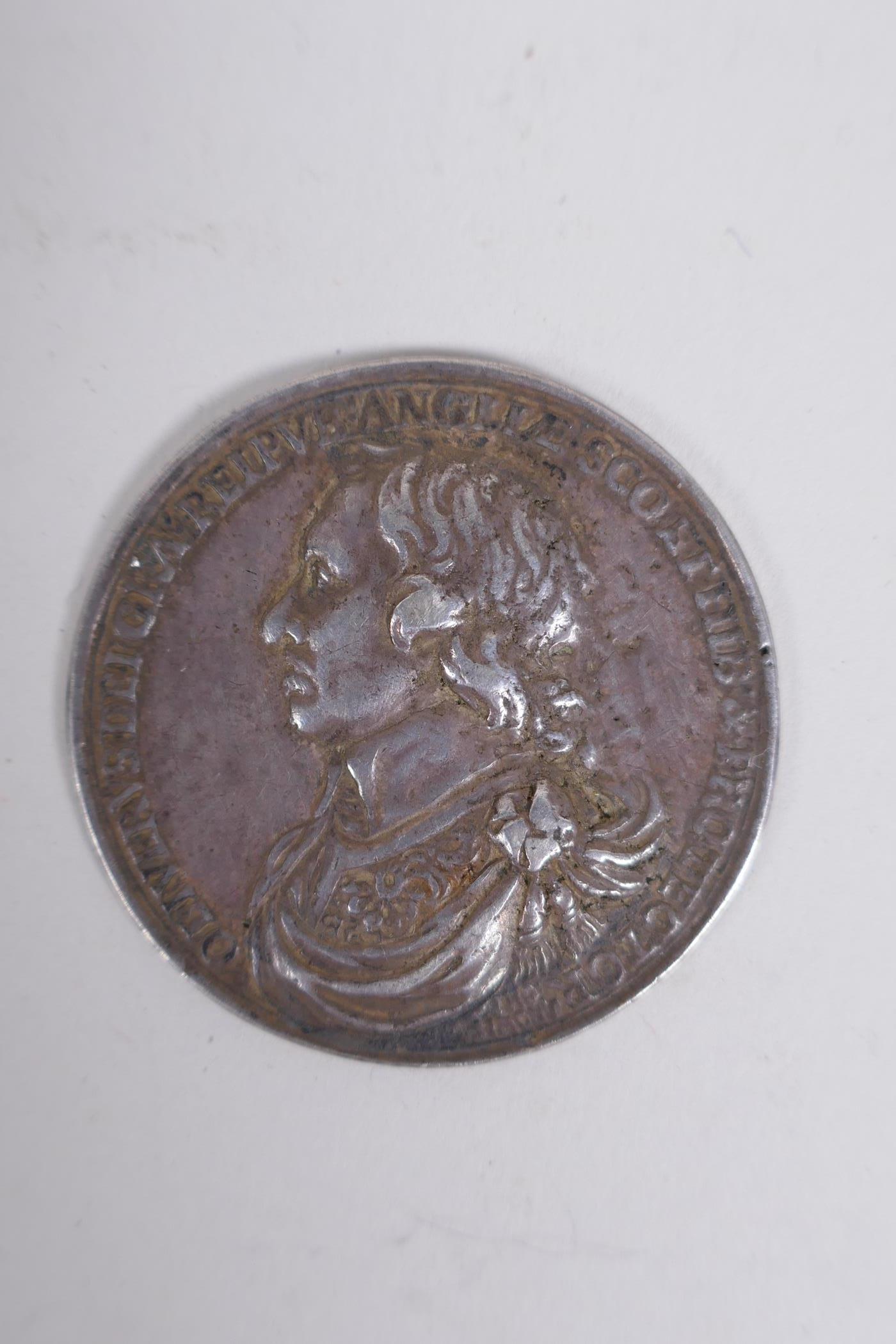 Oliver Cromwell, Lord Protector, cast silver medal, 1653, by Thomas Simon, armoured and draped - Image 2 of 4