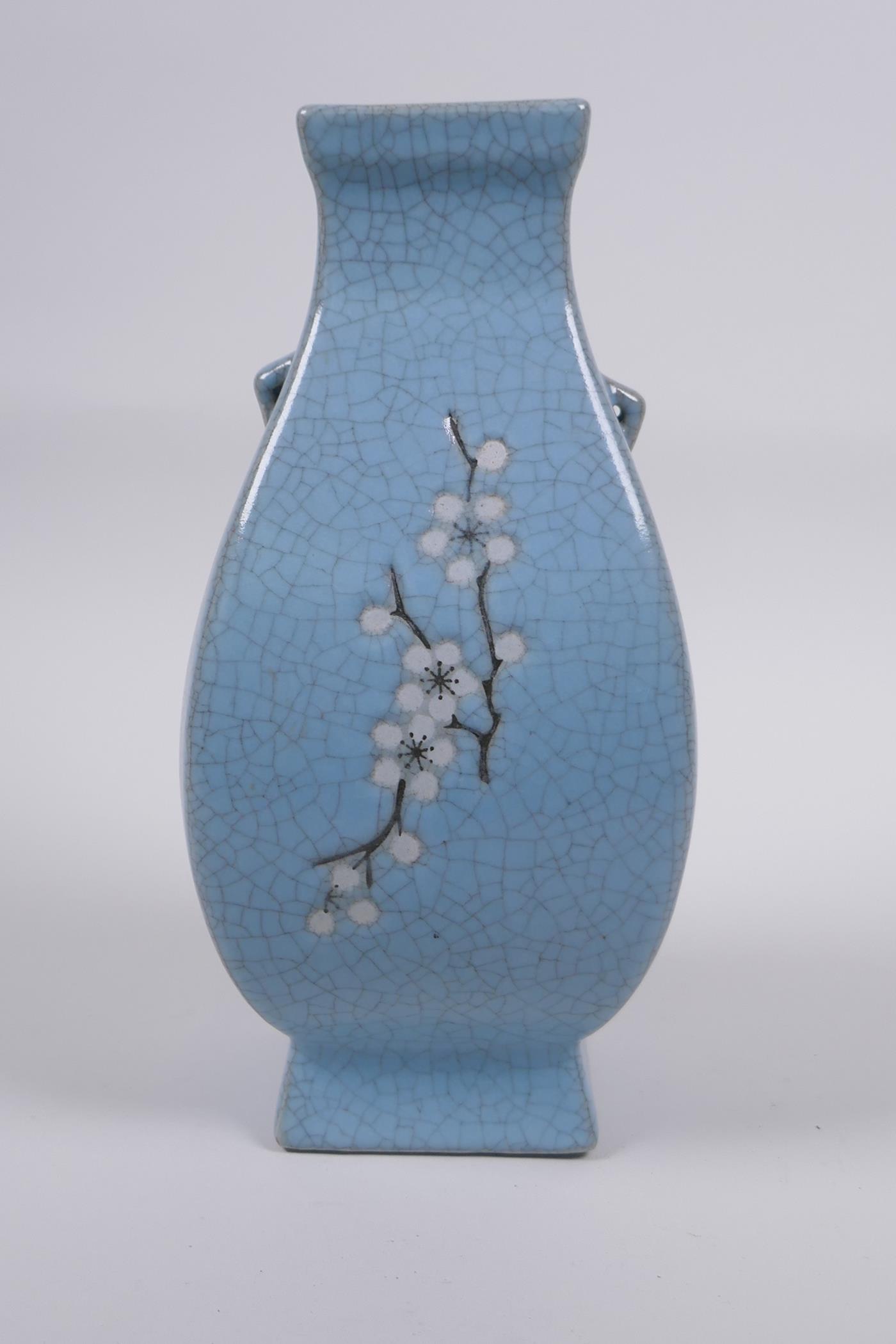 A Chinese celadon crackle glazed porcelain vase with two handles and floral decoration, 21cm high - Image 3 of 4