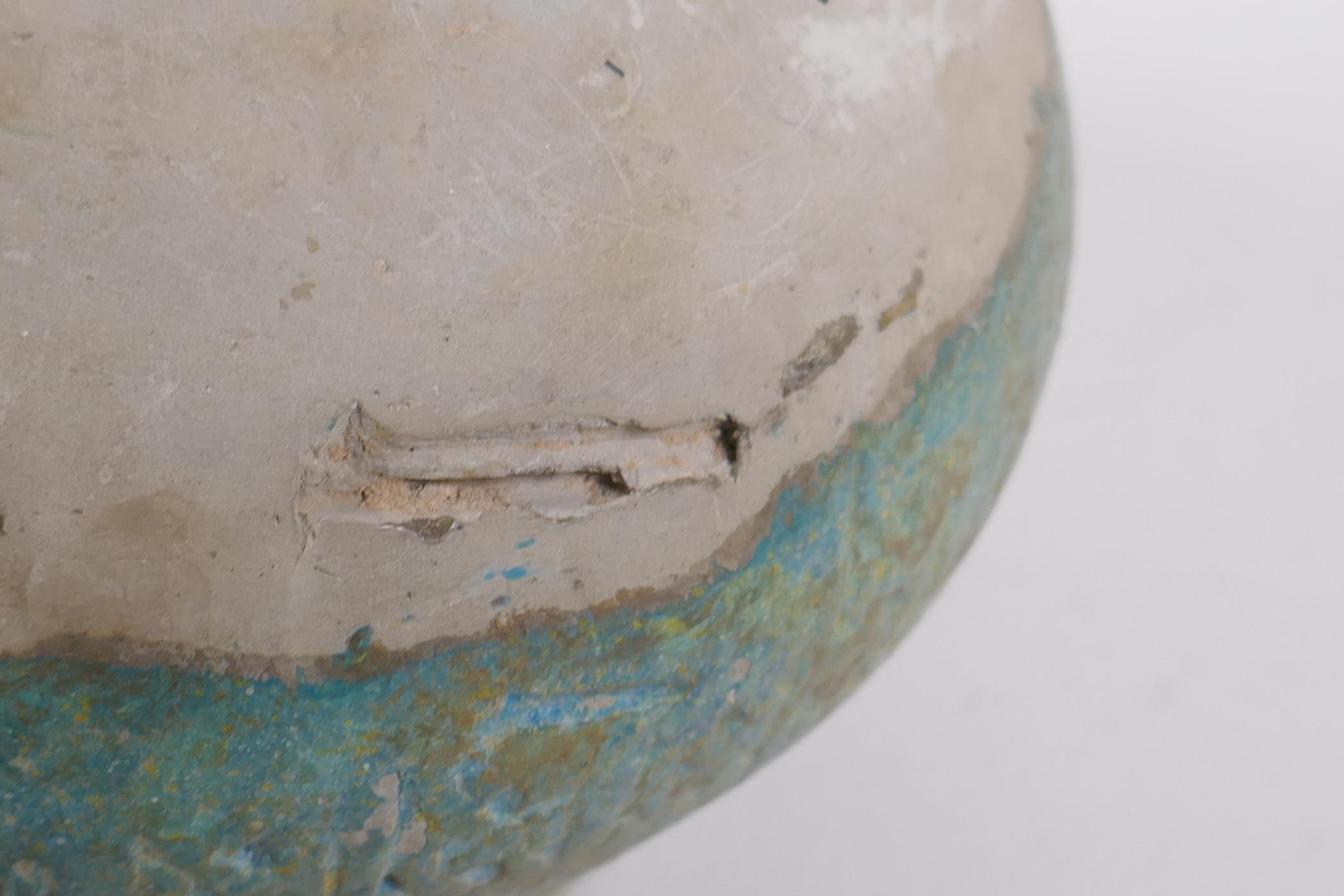 An antique turquoise slip glazed terracotta pot with a single handle, historic repairs, 14cm - Image 6 of 7