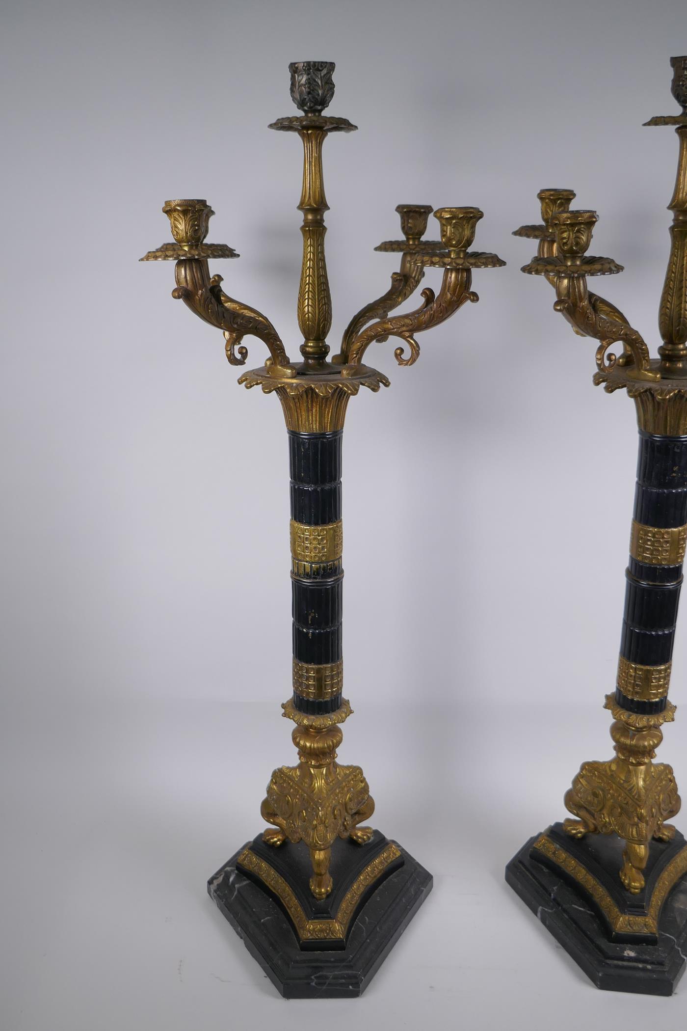 A pair of Empire style bronze and ormolu Corinthian column four branch candelabra, 80cm high - Image 2 of 7