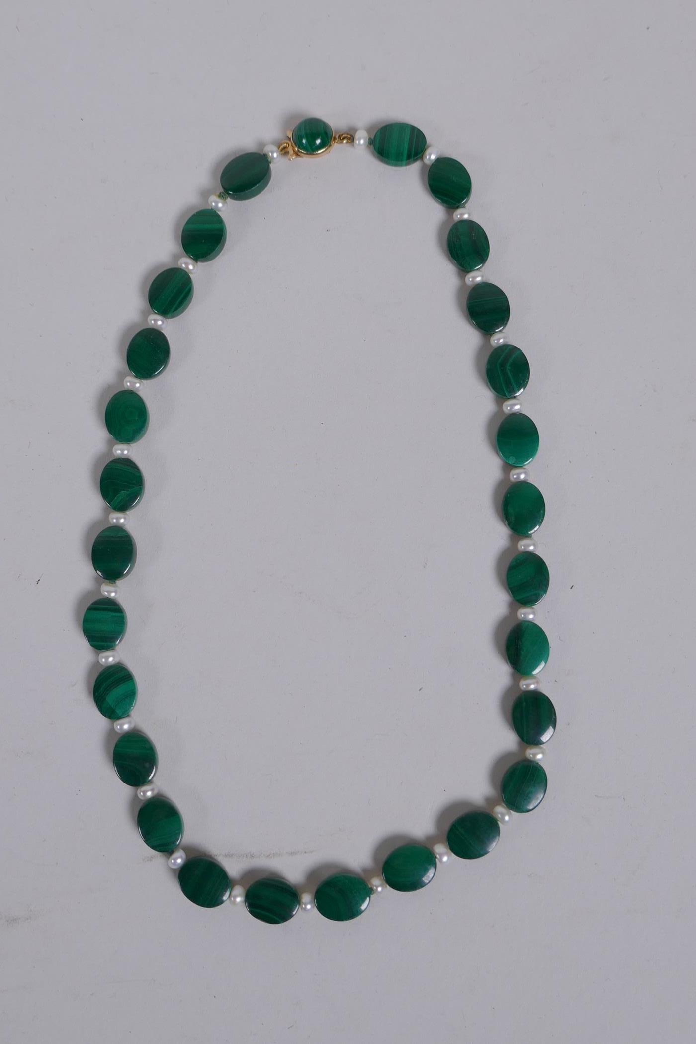 A malachite bead and seed pearl necklace with a 9ct gold clasp, 33cm long