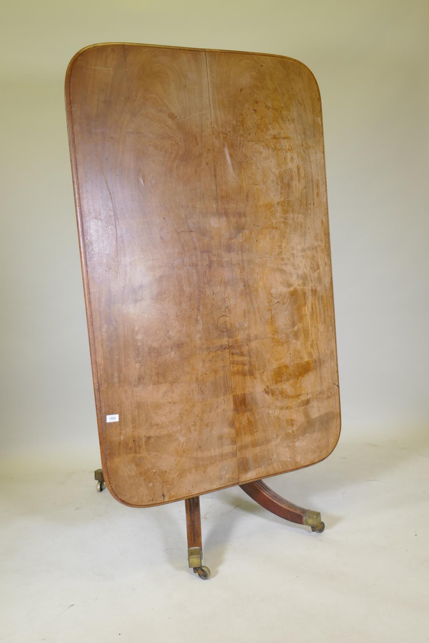 A mahogany breakfast table with an associated top, 95 x 148cm, 73cm high - Image 3 of 3