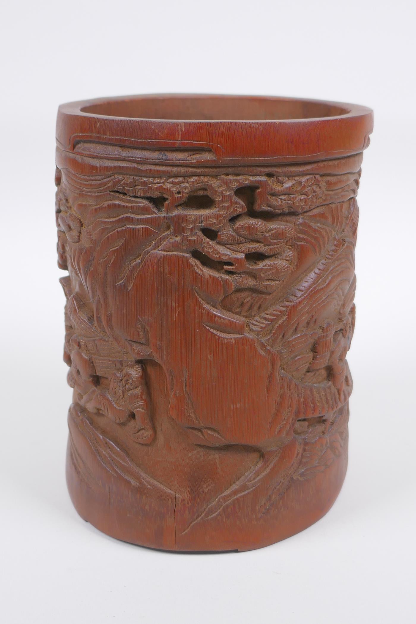 A Chinese carved bamboo brush pot decorated with figures in a landscape, 16cm high - Image 4 of 5