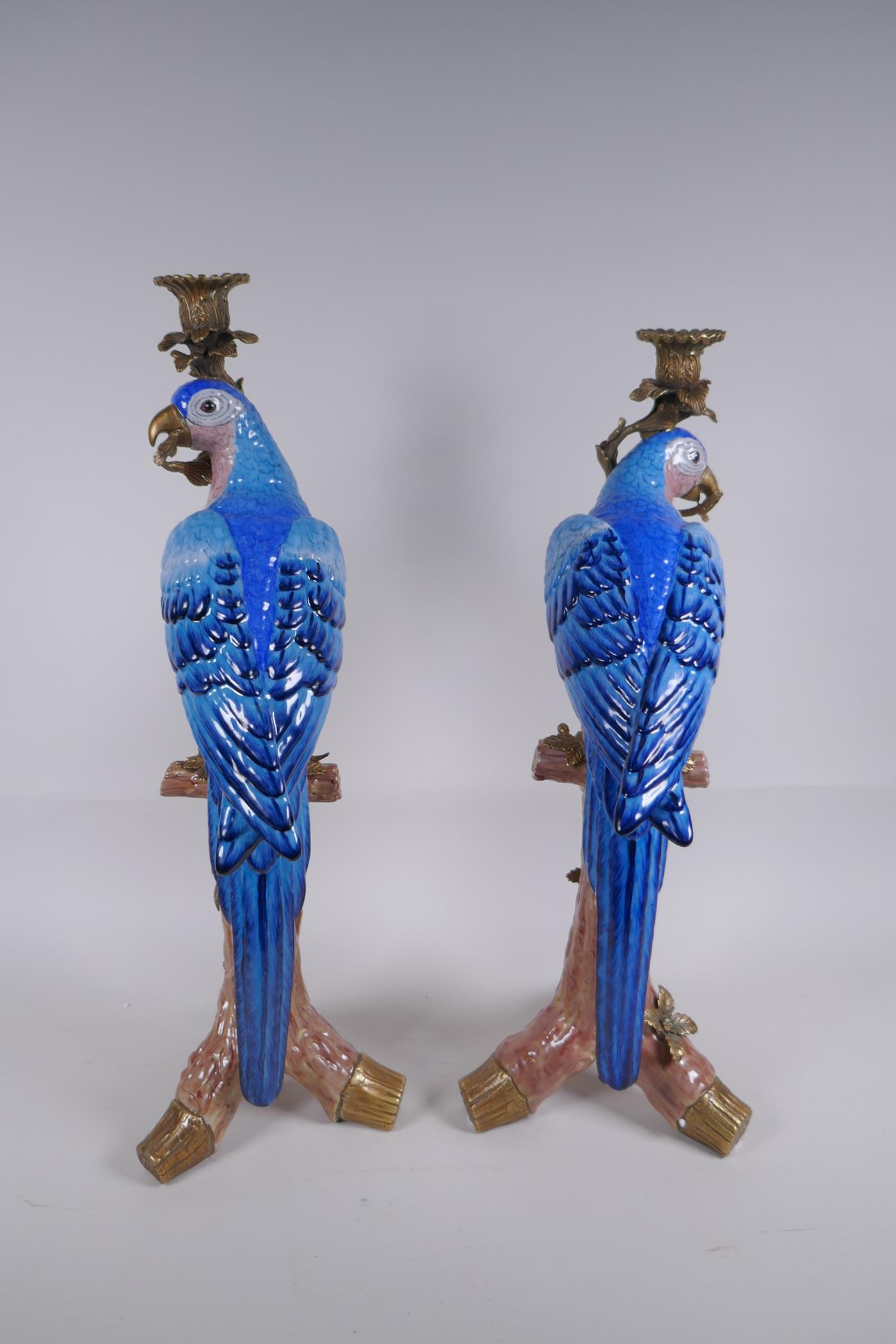 A pair of polychrome porcelain and gilt metal mounted parrot candlesticks, 52cm high - Image 3 of 4