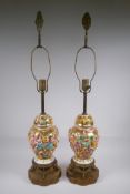 A pair of Capo di Monte jar and covers with raised neoclassical figural decoration, converted to