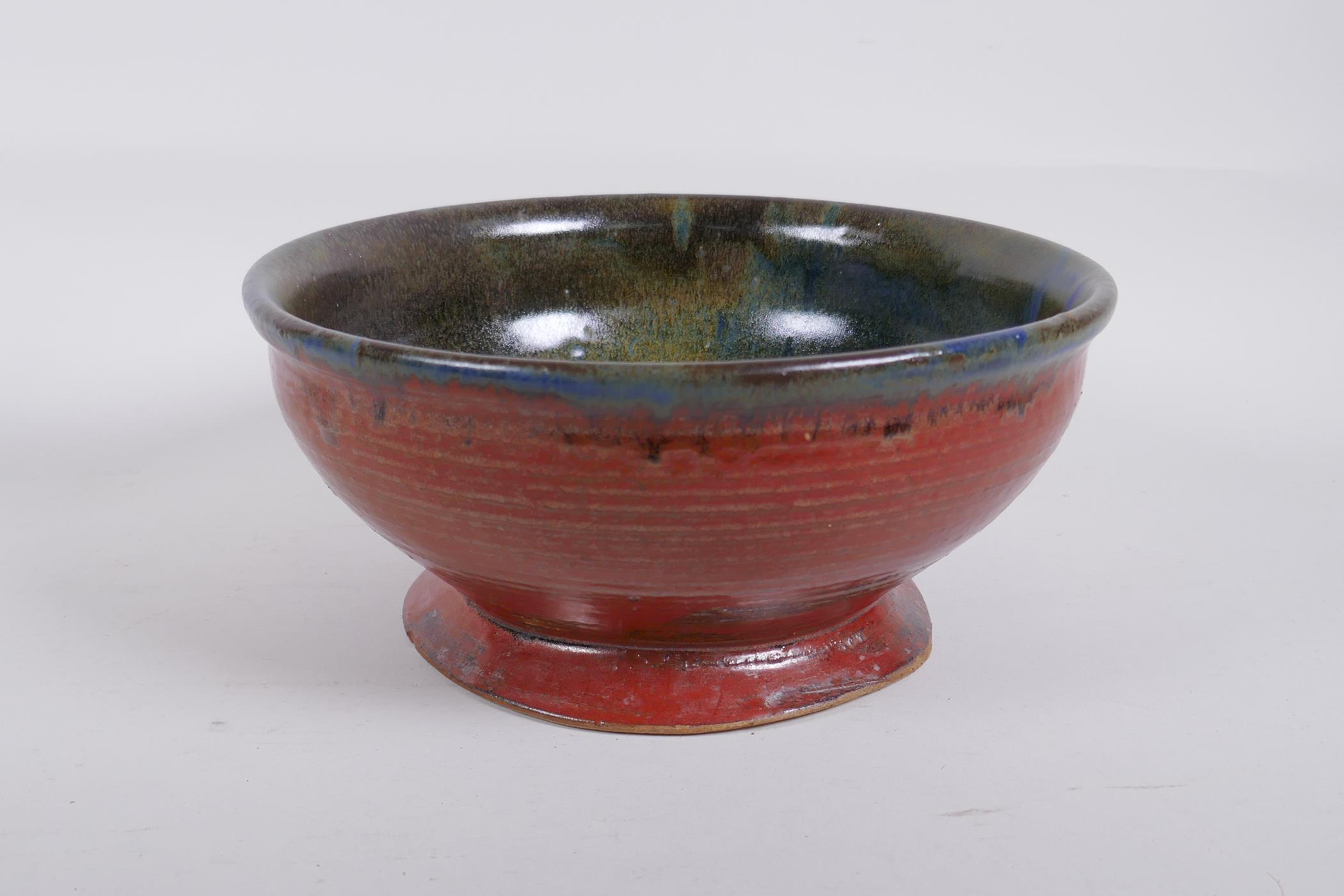 A studio pottery bowl with an iron red glaze to the exterior and hares fur style glaze to the - Image 2 of 7