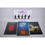 Four vintage concert programs including Genesis, We Can't Dance tour; Phil Collins, No Jacket