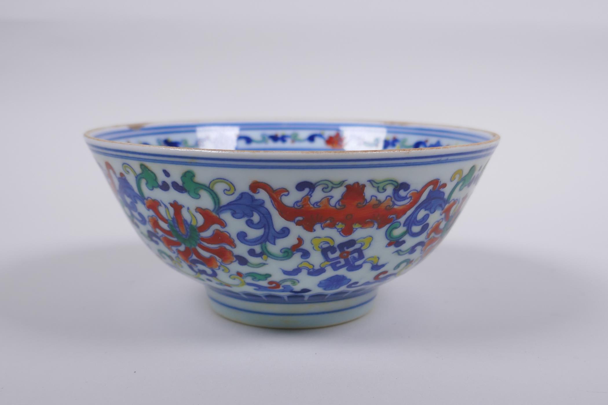 A Chinese wucai porcelain rice bowl decorated with bats and lotus flowers, YongZheng 6 character - Image 4 of 7