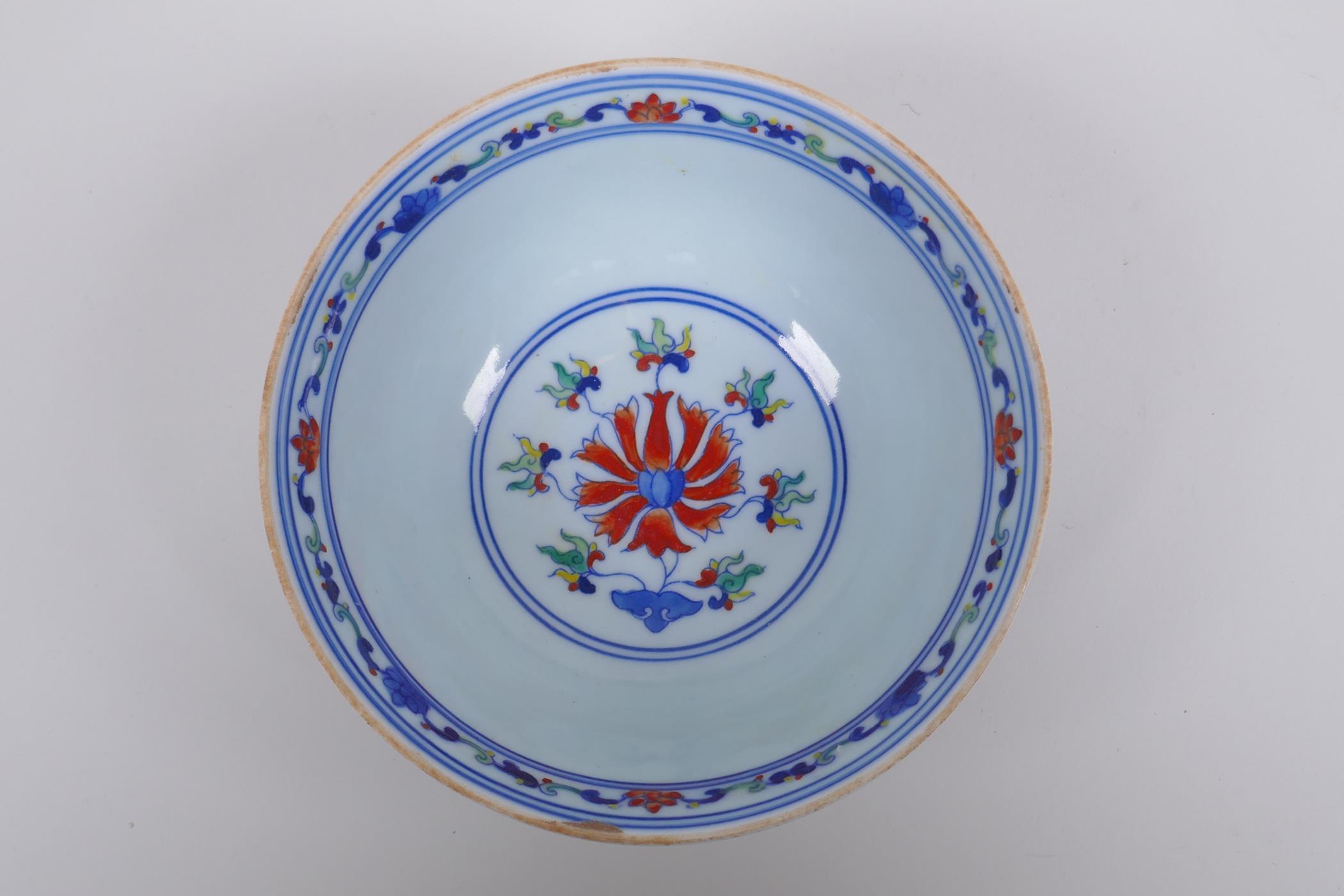 A Chinese wucai porcelain rice bowl decorated with bats and lotus flowers, YongZheng 6 character - Image 2 of 7