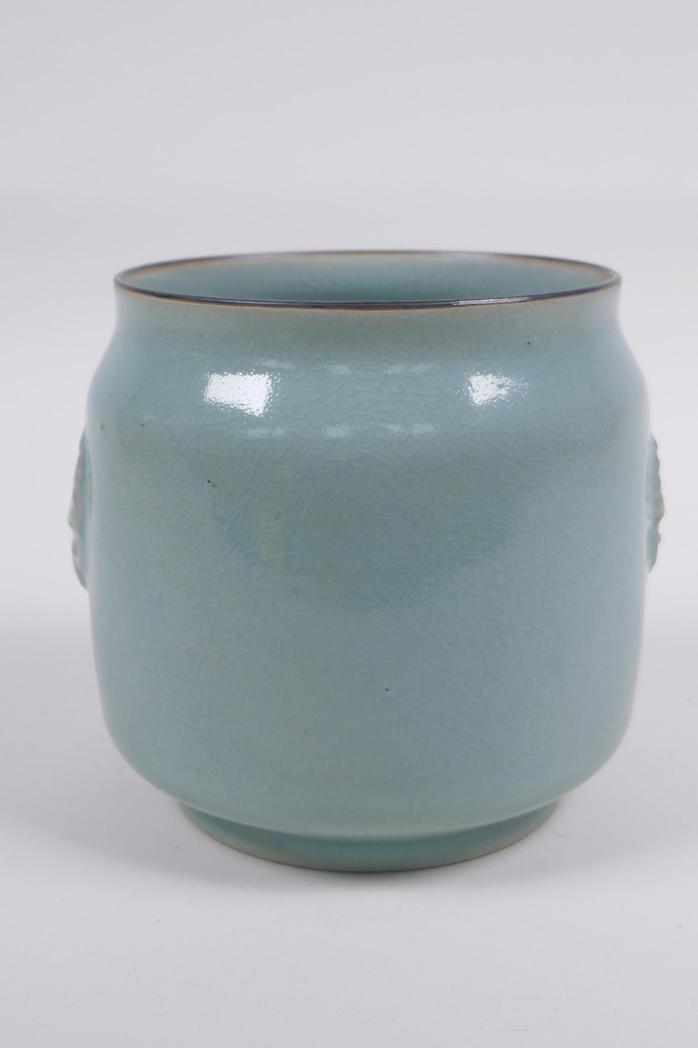 Chinese Ru ware style celadon glazed jar with twin mask decoration, 12cm high x 12cm diameter - Image 4 of 5