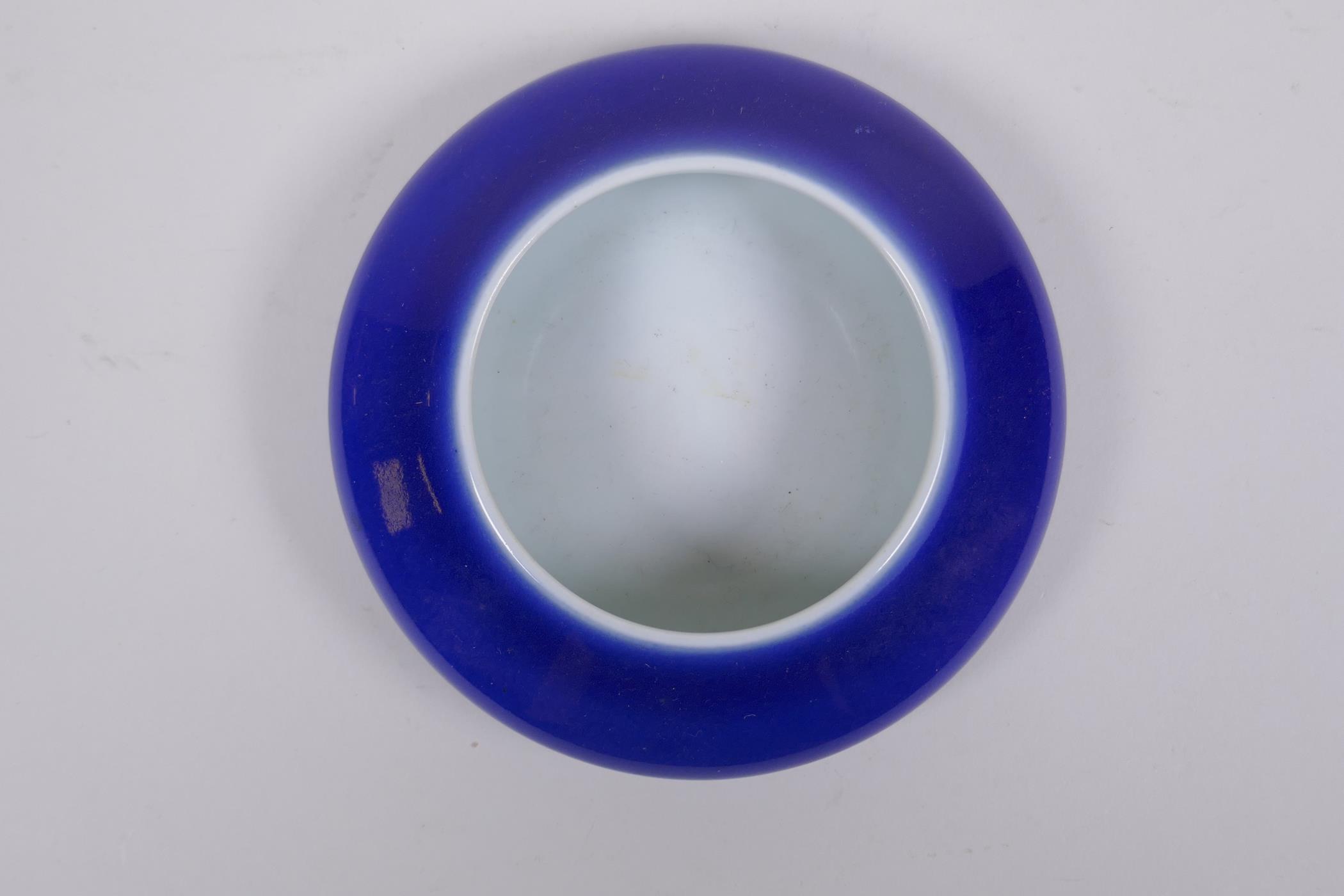A Chinese powder blue glazed porcelain ink wash of shallow form, 13cm diameter - Image 2 of 3