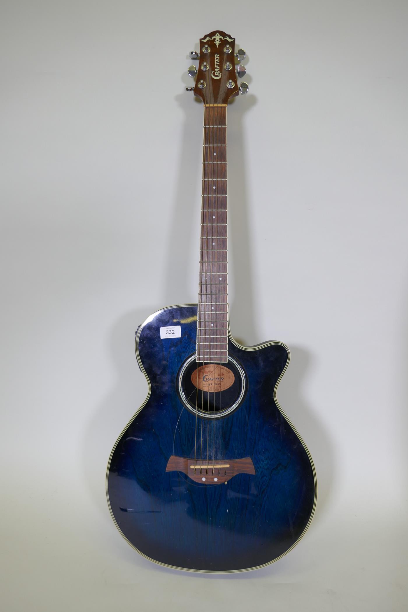 A Crafter fibreglass model FX550 EQ electro acoustic guitar