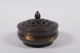 A Chinese gilt splash bronze censer and pierced cover, with bat and auspicious symbol decoration,