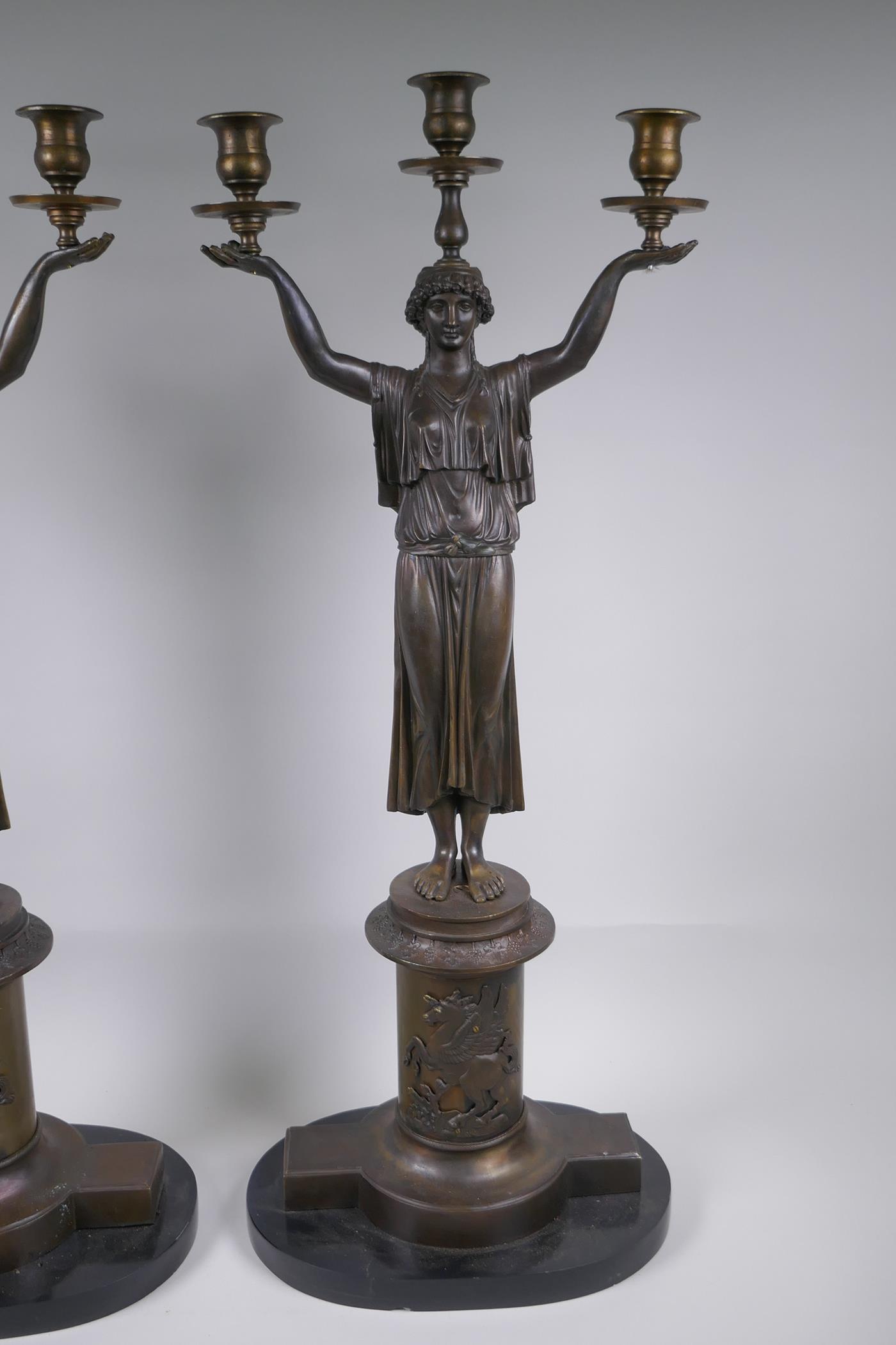 A pair of Empire style bronze three branch figural candlesticks in the form of classical women, 74cm - Image 3 of 7