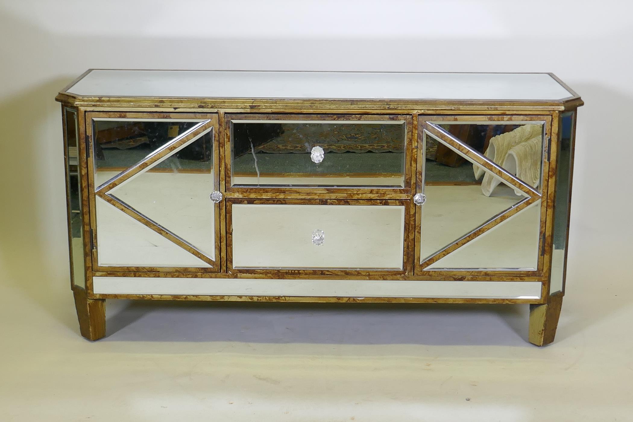 A giltwood side cabinet with inset bevelled mirrored glass, two cupboards flanking two drawers, with - Image 2 of 6