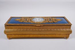 A C19th French ormolu and enamel jewellery box decorated with a portrait of Marie Antoinette, signed